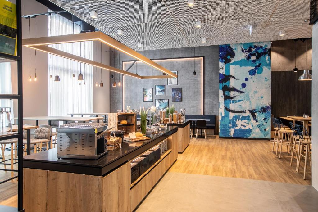 Área do café da manhã do H2 Hotel Budapest