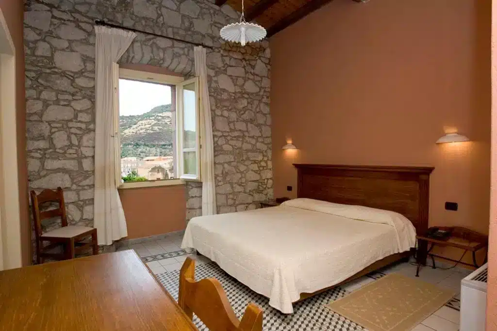 Quarto de hotel em Bosa
